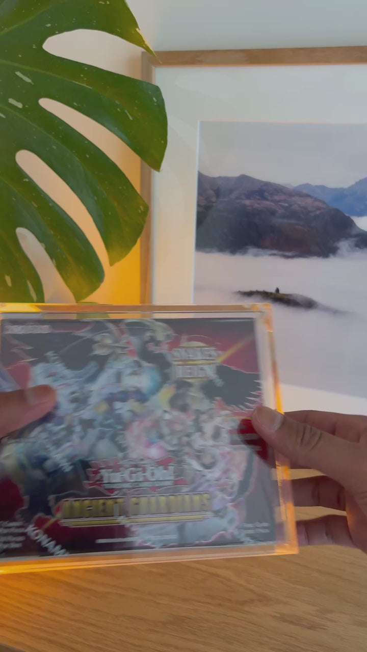 Yu-Gi-Oh! booster box acrylic case, held in hand – ACRYLIX