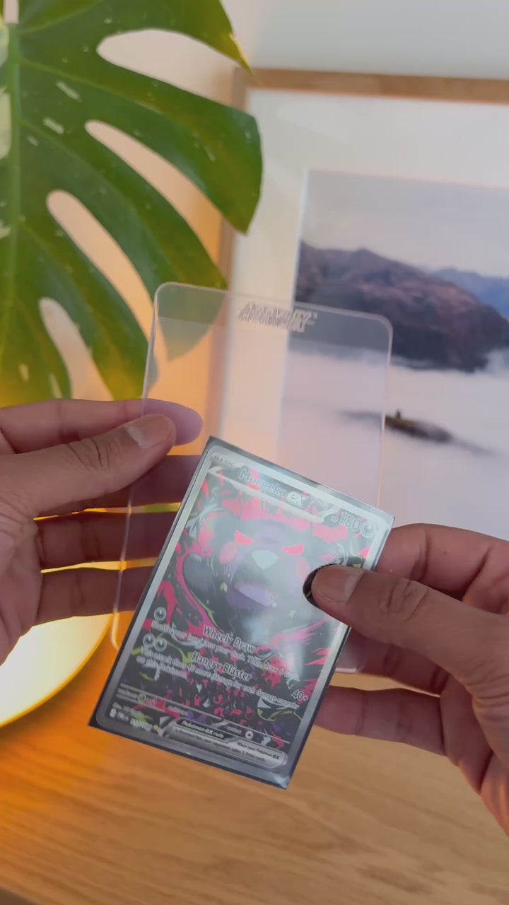 Sleeved Pokémon card going into a semi-rigid grading holder – ACRYLIX