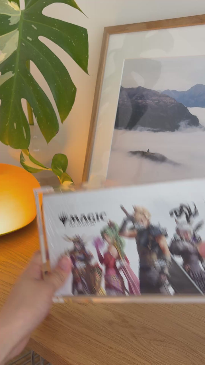 Magic: The Gathering Play Booster box acrylic case holding Final Fantasy, held in hand – ACRYLIX