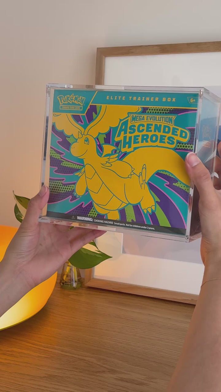 Pokémon Elite Trainer Box acrylic case holding Ascended Heroes, held in hand – ACRYLIX