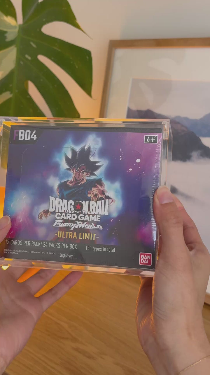 Dragon Ball Super: Fusion World English booster box acrylic case holding FB04 Ultra Limit, held in hand – ACRYLIX